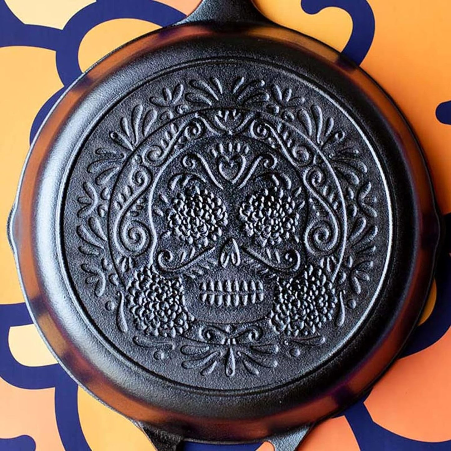 Lodge 10.25 Inch Pre-Seasoned Cast Iron Stamped Skillet Electric Blue Silicone Hot Handle Holder - Reusable Heat Protection Up to 500° - Sugar Skull