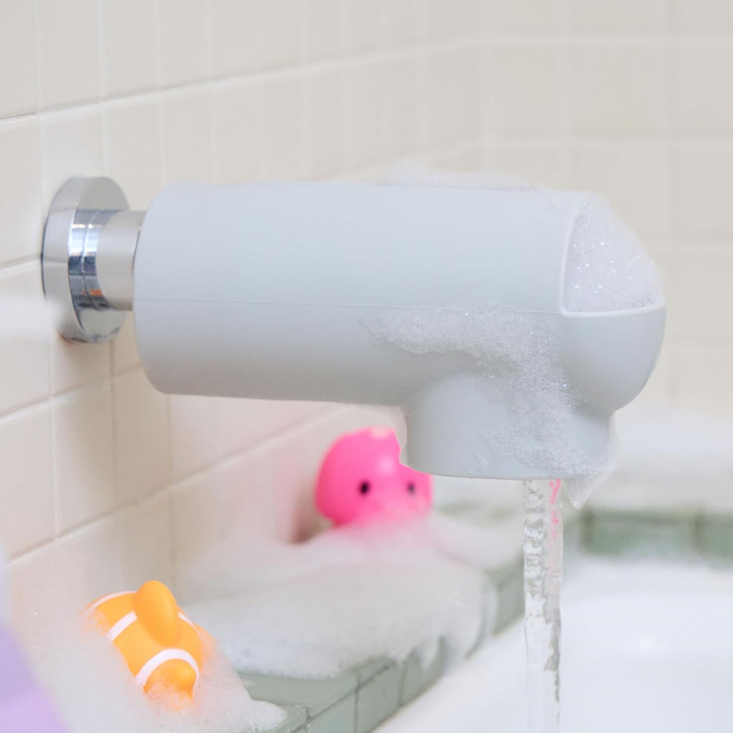 Munchkin® Soft Spot™ Bath Spout Cover for Baby, Bathtub Guard with Built-in Bubble Bath Dispenser, Silicone, Grey