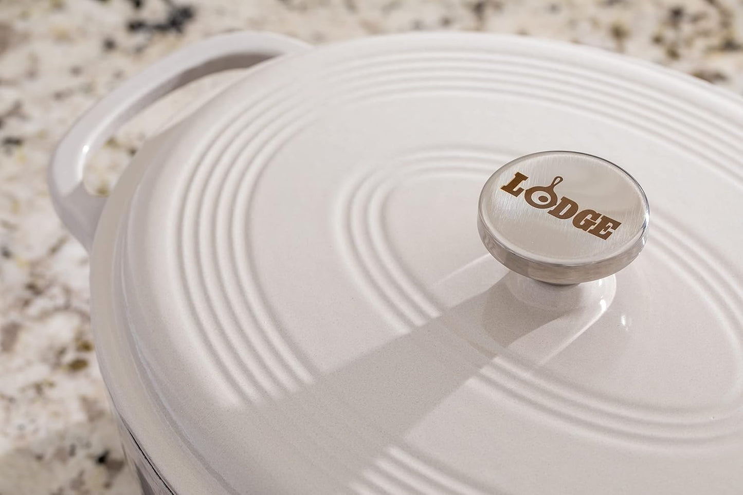 Lodge 7 Quart Enameled Cast Iron Oval Dutch Oven with Lid – Dual Handles – Oven Safe up to 500° F or on Stovetop - Use to Marinate, Cook, Bake, Refrigerate and Serve – Oyster White