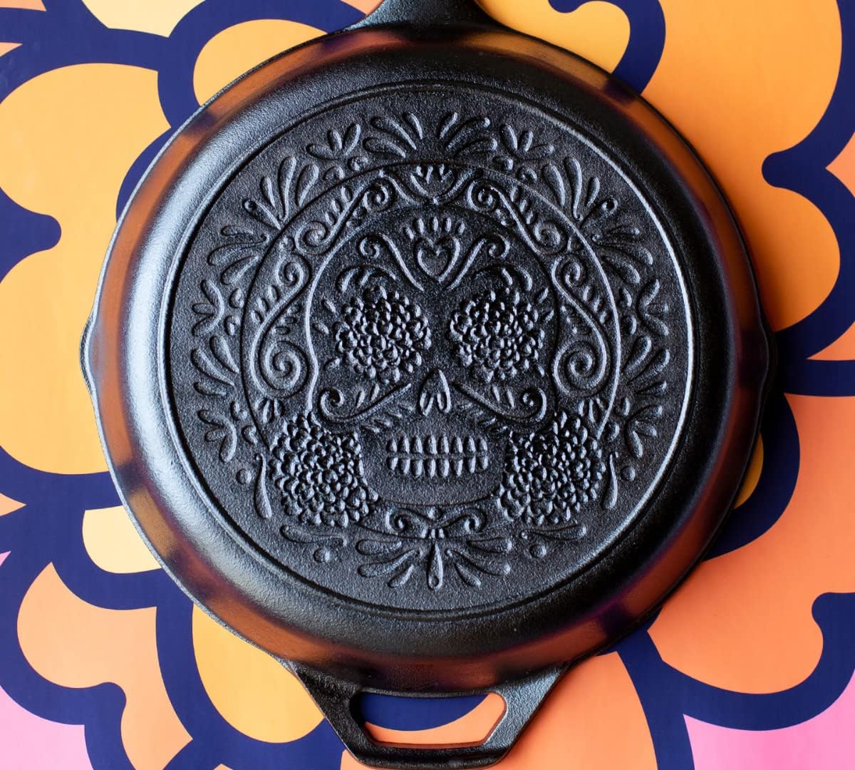Lodge 10.25 Inch Pre-Seasoned Cast Iron Stamped Skillet - Signature Teardrop Handle - Use in the Oven, on the Stove, on the Grill, or Over a Campfire - Sugar Skull