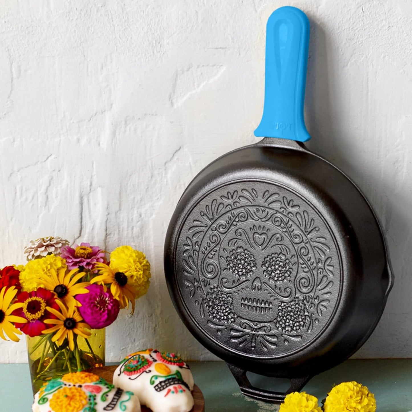 Lodge 10.25 Inch Pre-Seasoned Cast Iron Stamped Skillet Electric Blue Silicone Hot Handle Holder - Reusable Heat Protection Up to 500° - Sugar Skull