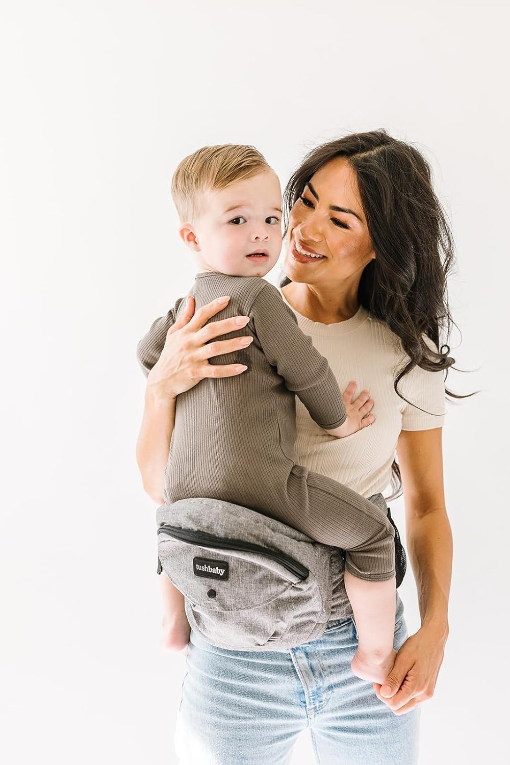 Tushbaby Original Hip Seat Baby Carrier for Babies & Toddlers up to 45 lbs, Safety Certified, Lightweight No-Foam Design with Storage, Grey