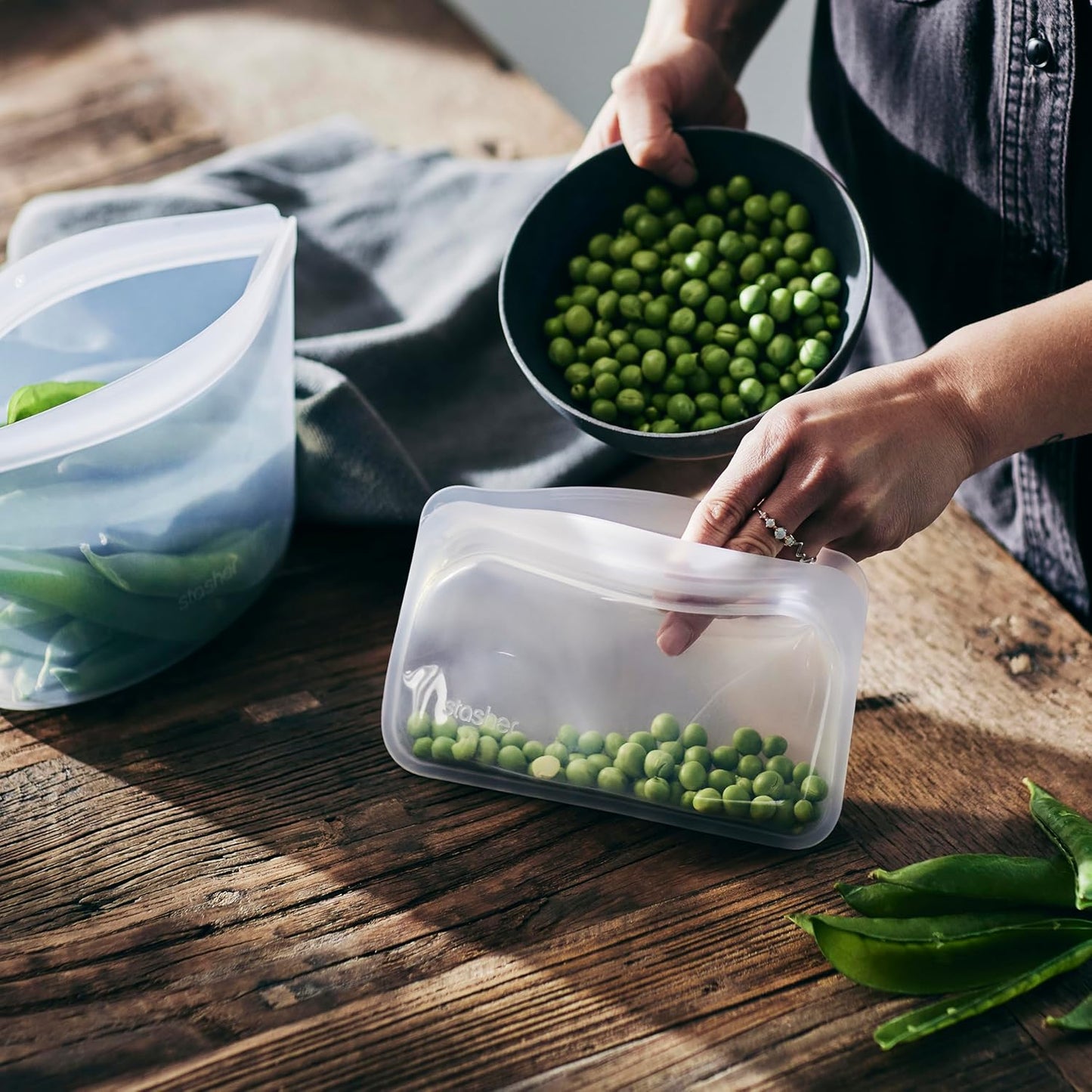 Stasher Silicone Reusable Storage Bag, Freezer Bag, Reusable Snack Bags, Microwave, Dishwasher, Oven Safe, Sous Vide, Premium Lunch Container, Eco Friendly, Food Storage Bag, 12 oz, Clear | Reusable Food Bag