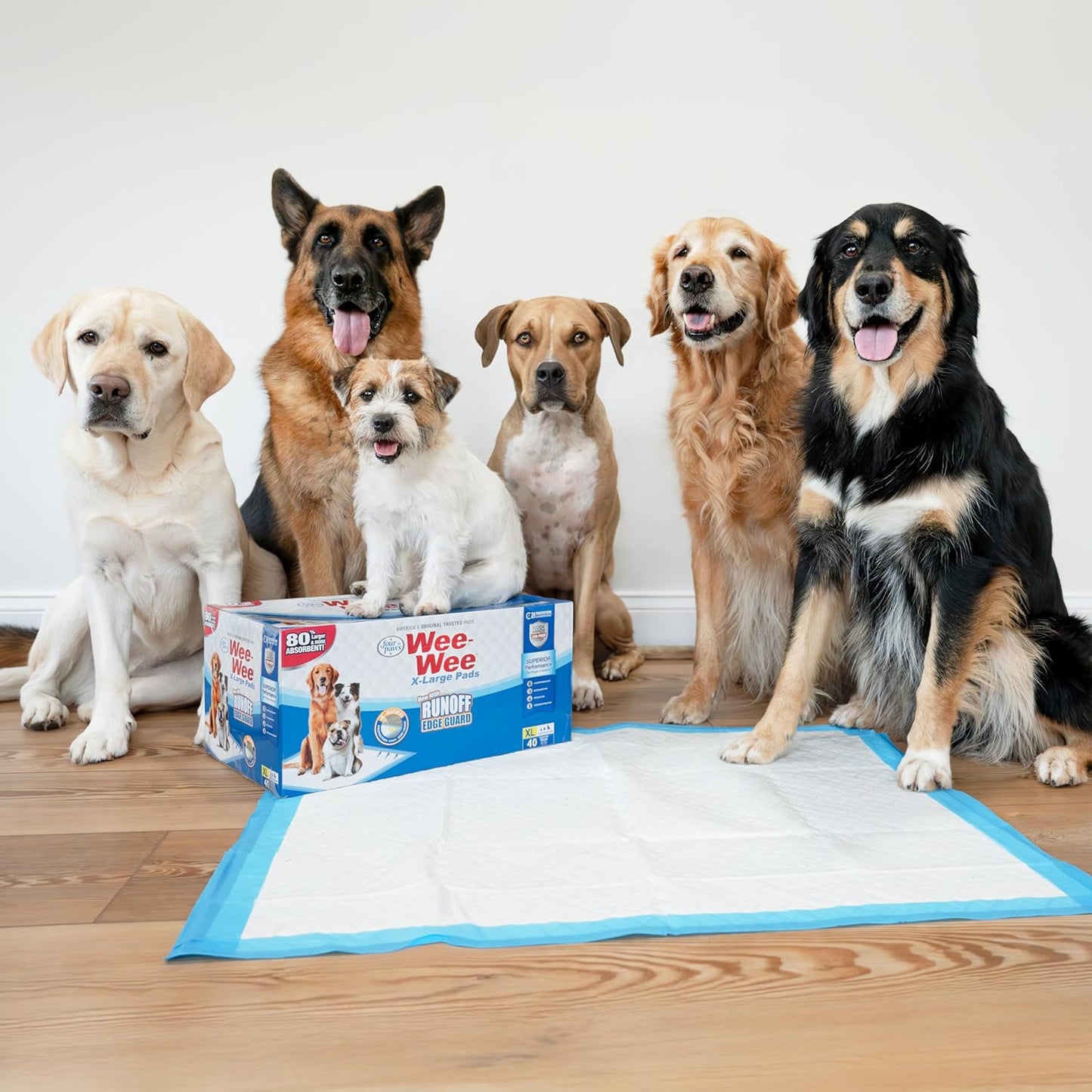 Four Paws Wee-Wee Superior Performance Pee Pads for Dogs with Runoff Barrier Edge Guard Protection, Puppy & Dog Potty Training Pads, Housebreaking Supplies, 27.5" x 44" (8 Count)