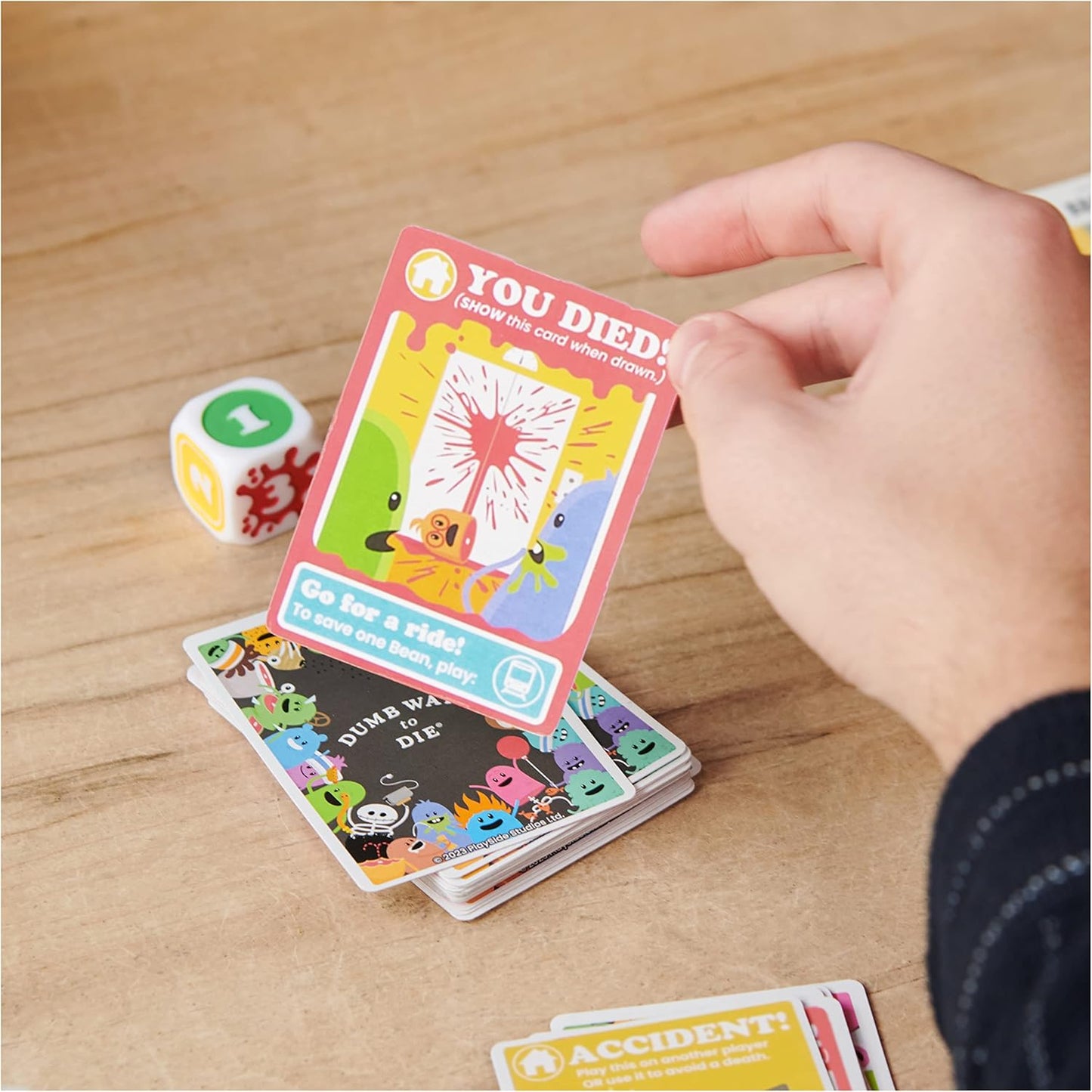 Spin Master Games, Dumb Ways to Die, The Viral Meme Card Game from YouTube and TikTok, Survival Strategy Fun, 2-5 Players, Easter Gift, for Ages 12 & Up