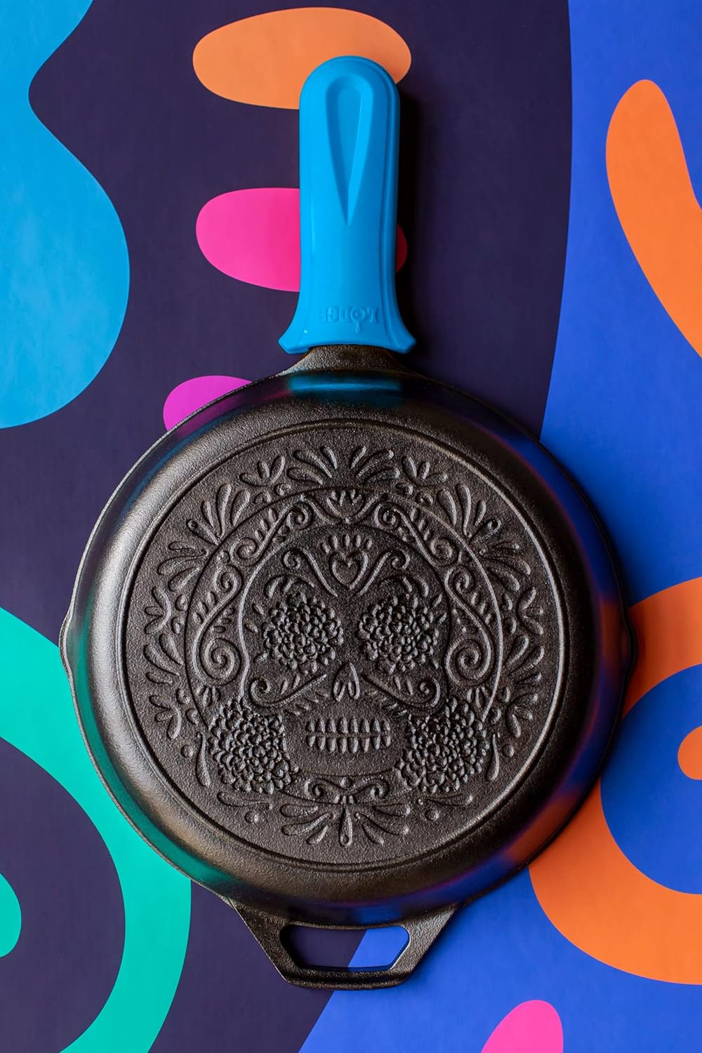 Lodge 10.25 Inch Pre-Seasoned Cast Iron Stamped Skillet Electric Blue Silicone Hot Handle Holder - Reusable Heat Protection Up to 500° - Sugar Skull