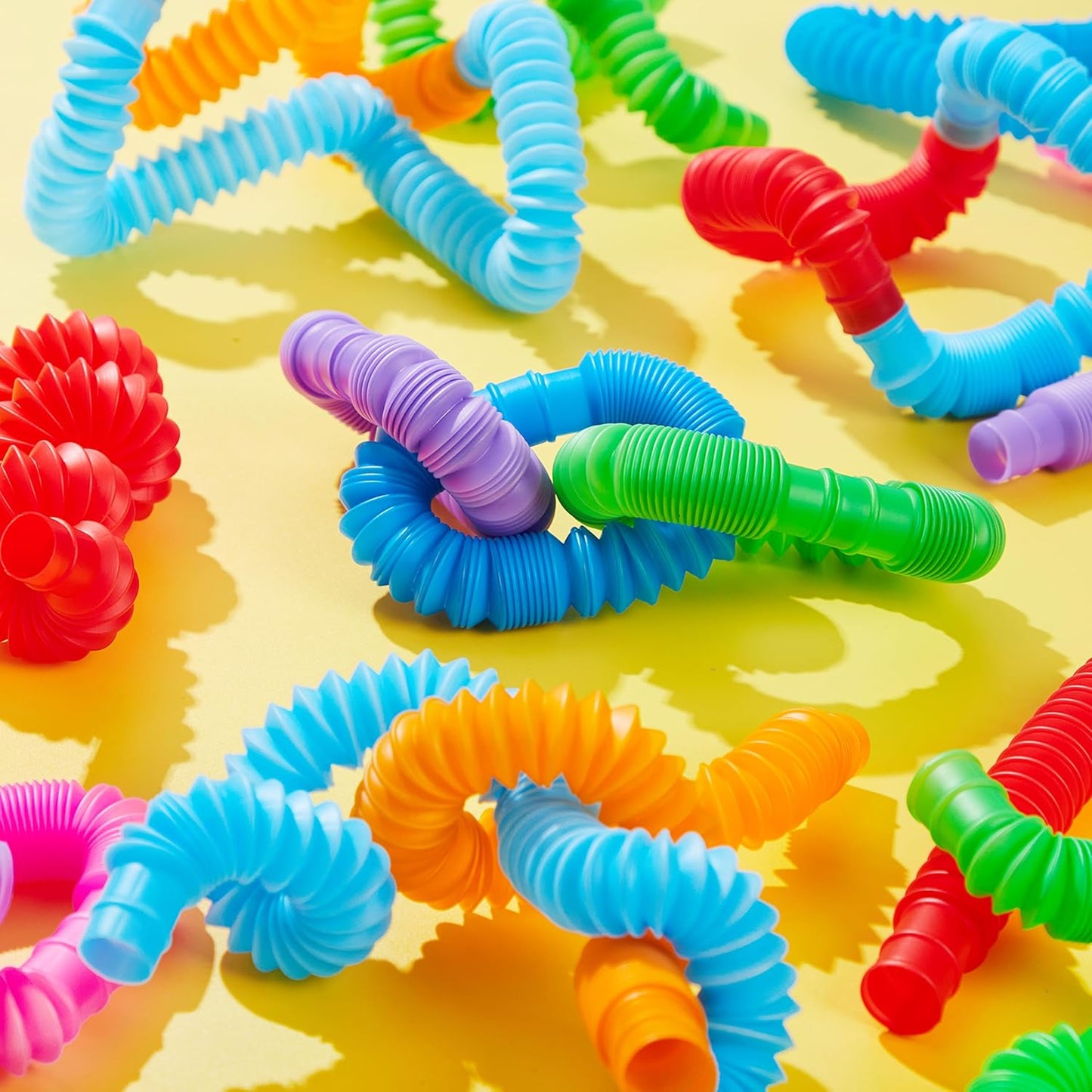 JOYIN 18 Pack Pop Tubes, Sensory Toys (Small) Fidget Toys Party Favors - 9 Colors, Creativity Learning & Fun for Toddler Kids - Perfect for Easter Goodie Bags, Classroom School Reward