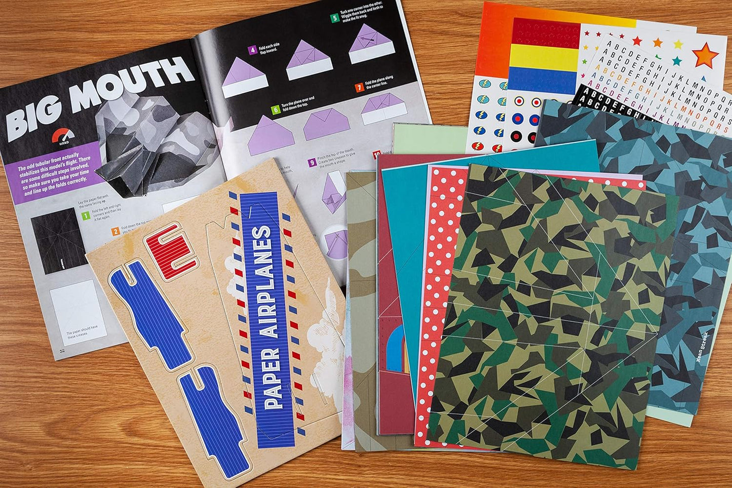 Paper Airplane Kit: 100 Planes to Fold & Fly, 1000 Stickers, Launcher & 100 Rubber Bands | Colorful Sheets | STEM Family Gift for Ages 7 and Up