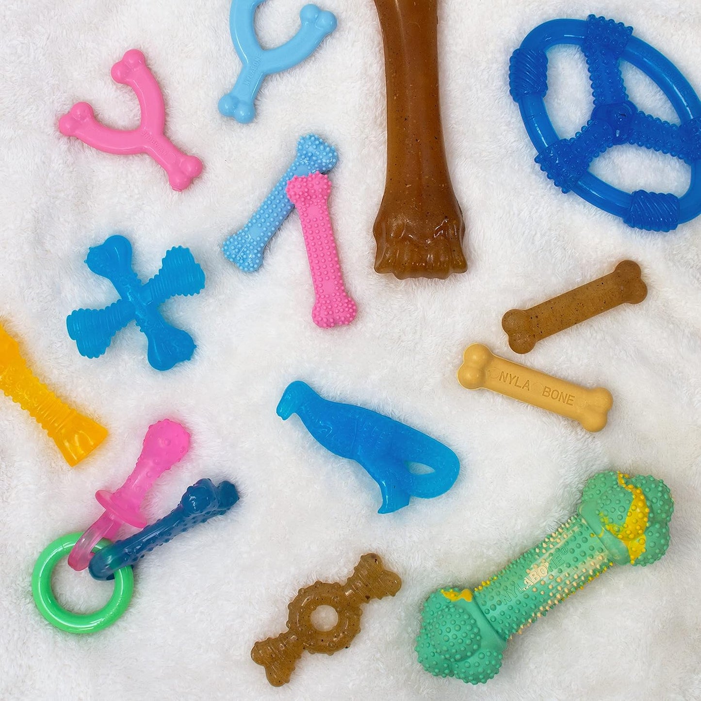 Nylabone Spin Tug & Play Puppy Chew Ring Toy, Soothing Puppy Teething Bone, Enrichment Toy for Puppies, Blue, Peanut Butter Flavor, Medium Dogs - Up to 35 lbs., 1 Count