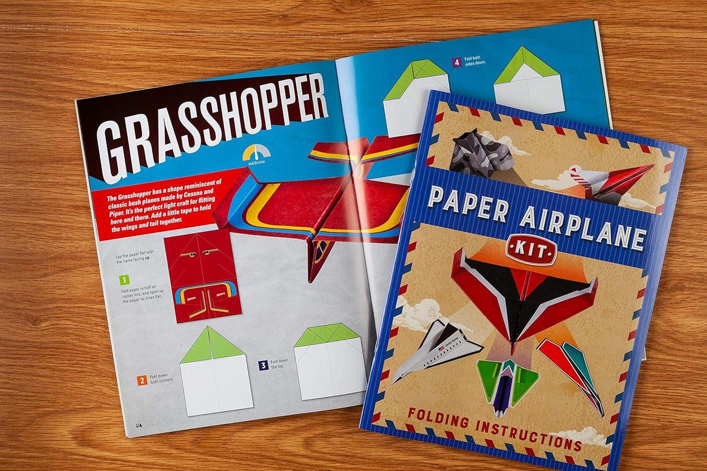 Paper Airplane Kit: 100 Planes to Fold & Fly, 1000 Stickers, Launcher & 100 Rubber Bands | Colorful Sheets | STEM Family Gift for Ages 7 and Up