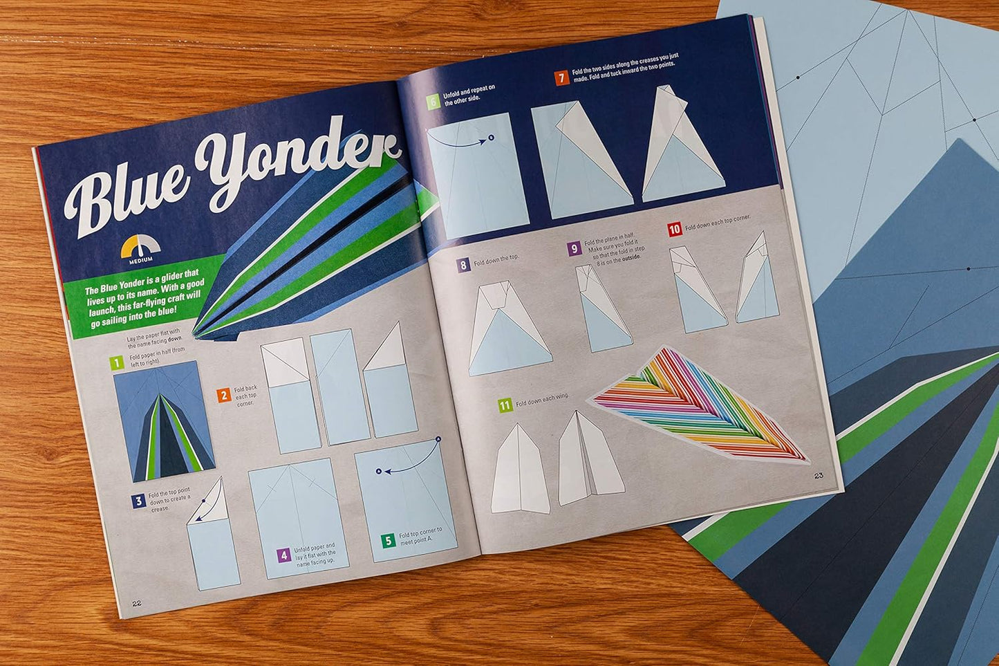 Paper Airplane Kit: 100 Planes to Fold & Fly, 1000 Stickers, Launcher & 100 Rubber Bands | Colorful Sheets | STEM Family Gift for Ages 7 and Up