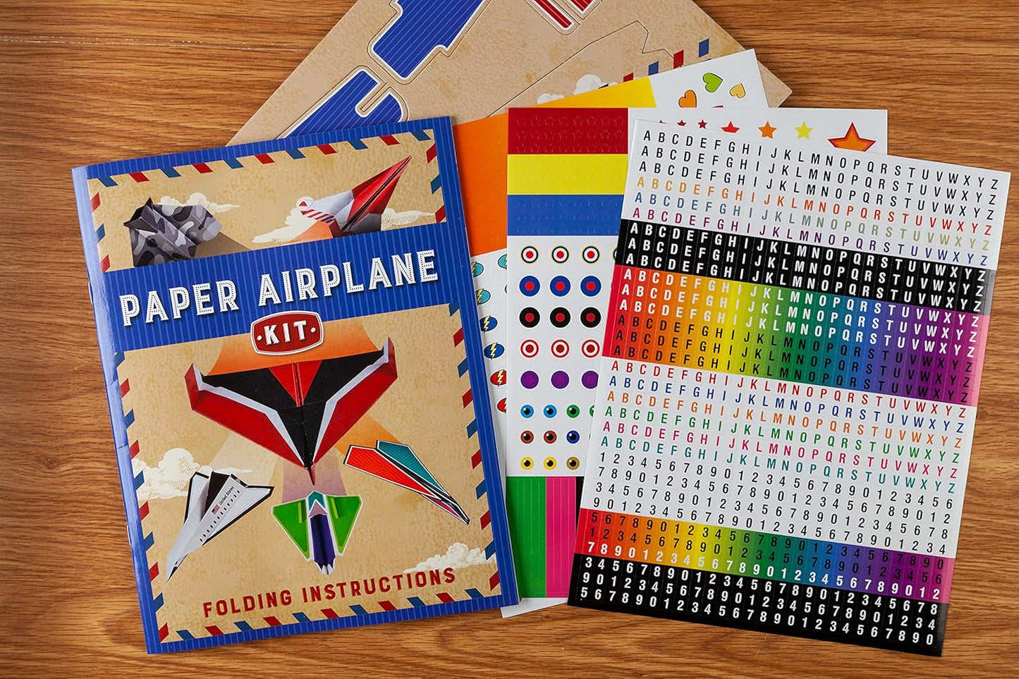 Paper Airplane Kit: 100 Planes to Fold & Fly, 1000 Stickers, Launcher & 100 Rubber Bands | Colorful Sheets | STEM Family Gift for Ages 7 and Up