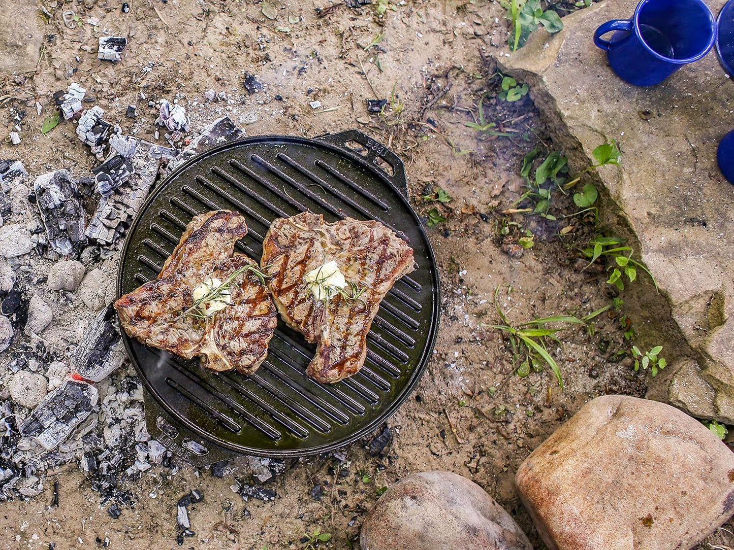 Lodge Cast Iron Cook-It-All Kit. Five-Piece Cast Iron Set includes a Reversible Grill/Griddle 14 Inch, 6.8 Quart Bottom/Wok, Two Heavy Duty Handles, and a Tips & Tricks Booklet.