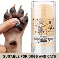 Soothing paw butter applied to senior dog paw