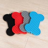 Dog lick mat used during bath and grooming